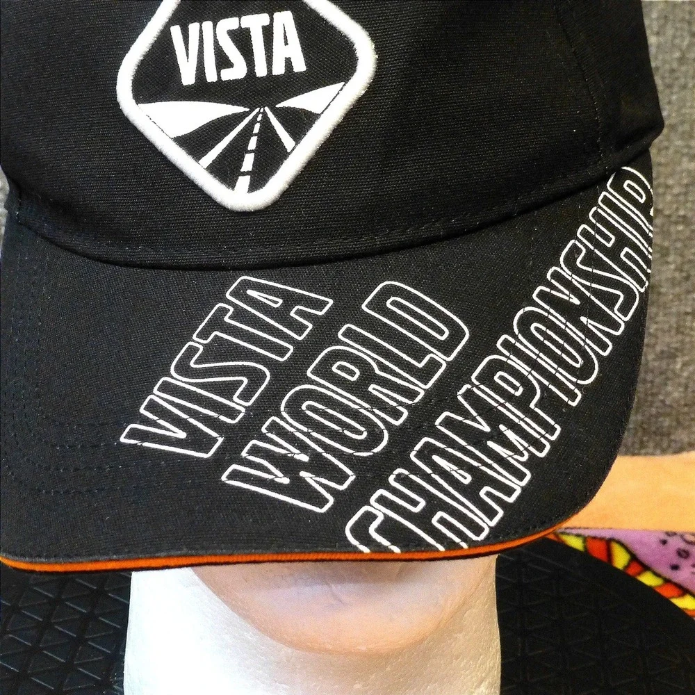 Volvo VISTA World Championship Hat Black Orange Performance Is Everything Cap